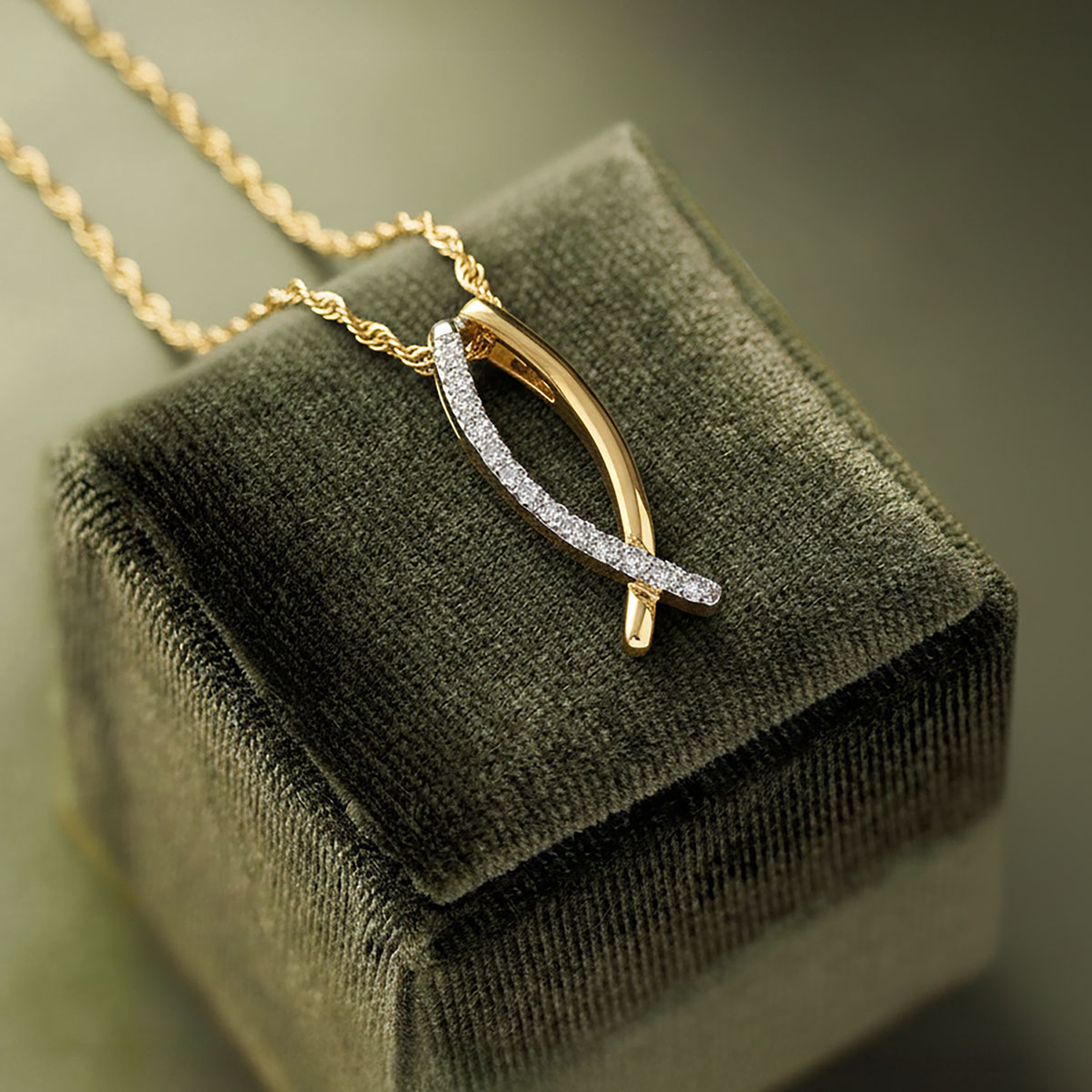 Two-tone diamond pendant on a gold chain